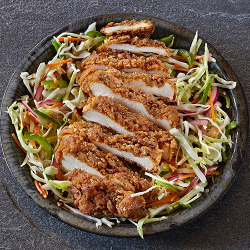 A salad with crispy chicken