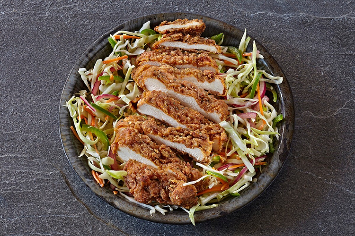 A salad with crispy chicken