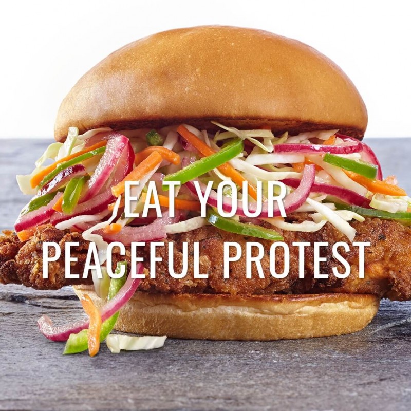 An Organic Coup Chicken Sandwich overlaid with the text 